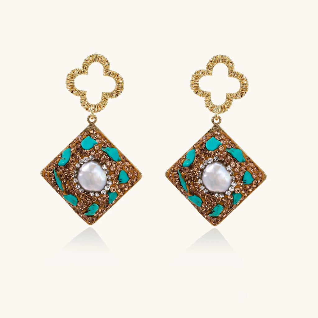 Gold-plated drop earrings with quatrefoil studs, diamond-shaped pendants featuring baroque pearls, turquoise stones, and amber crystals