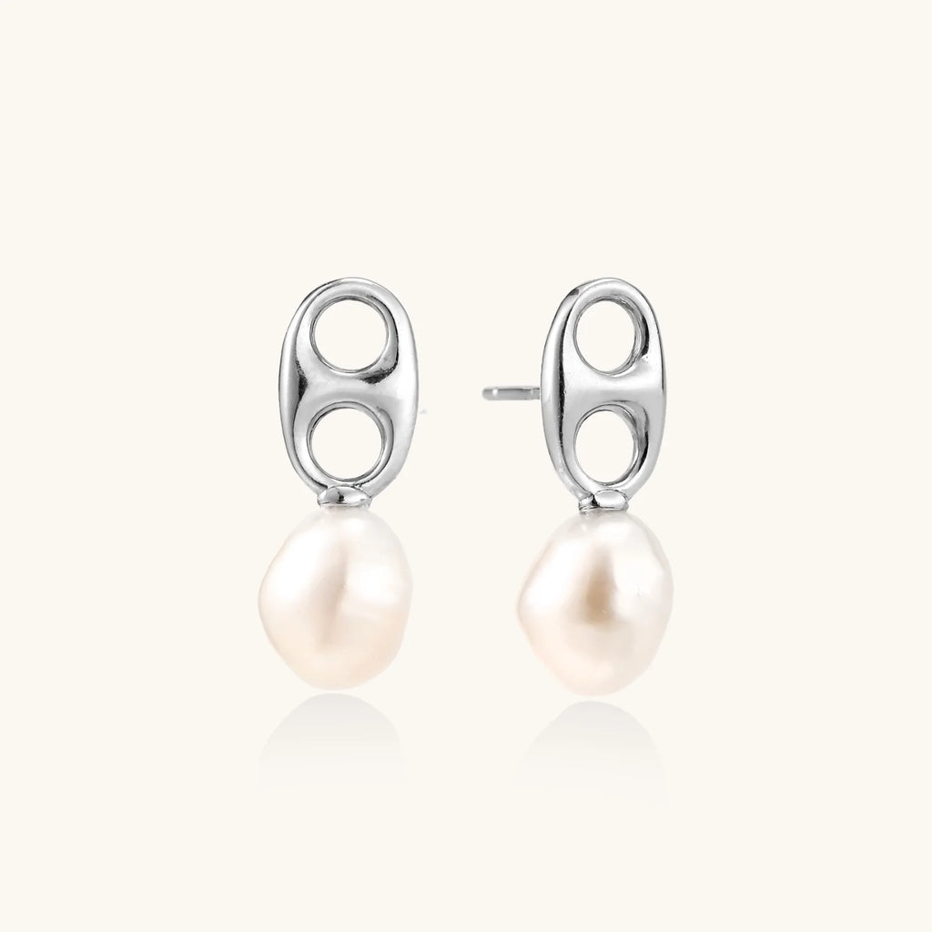 Modern rhodium-plated silver earrings with geometric double-circle design and freshwater pearl drops