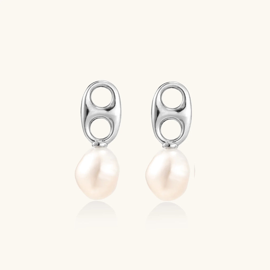 Modern rhodium-plated silver earrings with geometric double-circle design and freshwater pearl drops