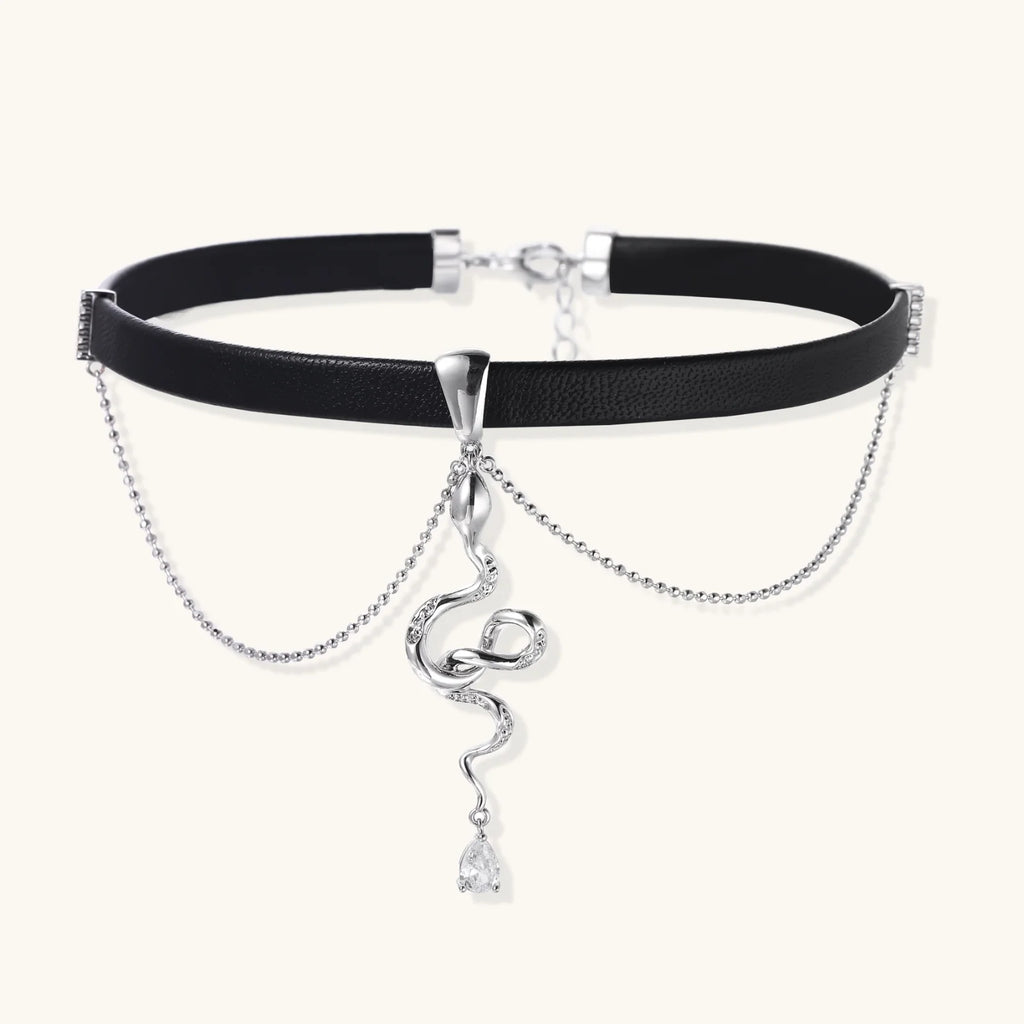 Black leather choker with white gold-plated serpent pendant adorned with zirconia crystals and teardrop charm