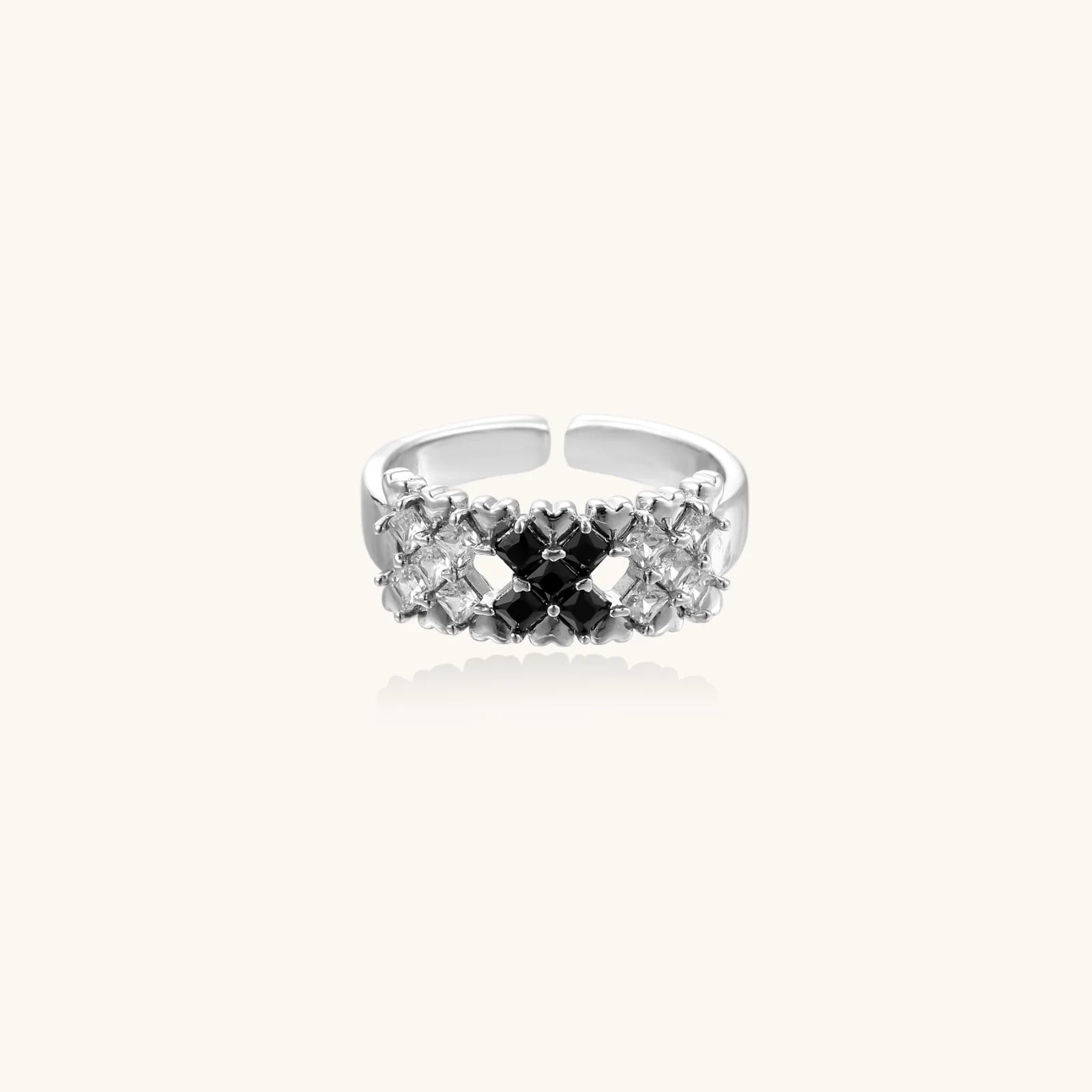 White gold plated adjustable ring with three rows of square zirconia stones in black or pink chevron pattern